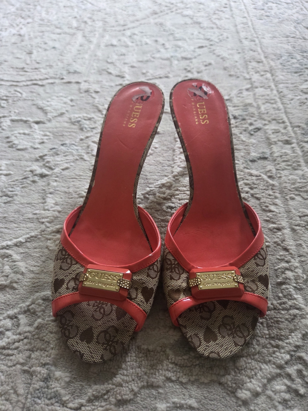 GUESS Coral and Brown Logo Slide Mules with Gold Plaques